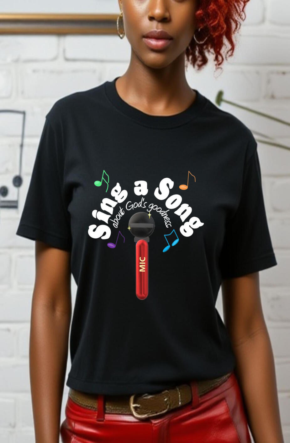 Sing A Song About His Goodness Christian T-shirt, featuring a red microphone with colorful music notes.